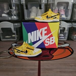 Nike SB Pikachu pair of mini sneakers keychain.